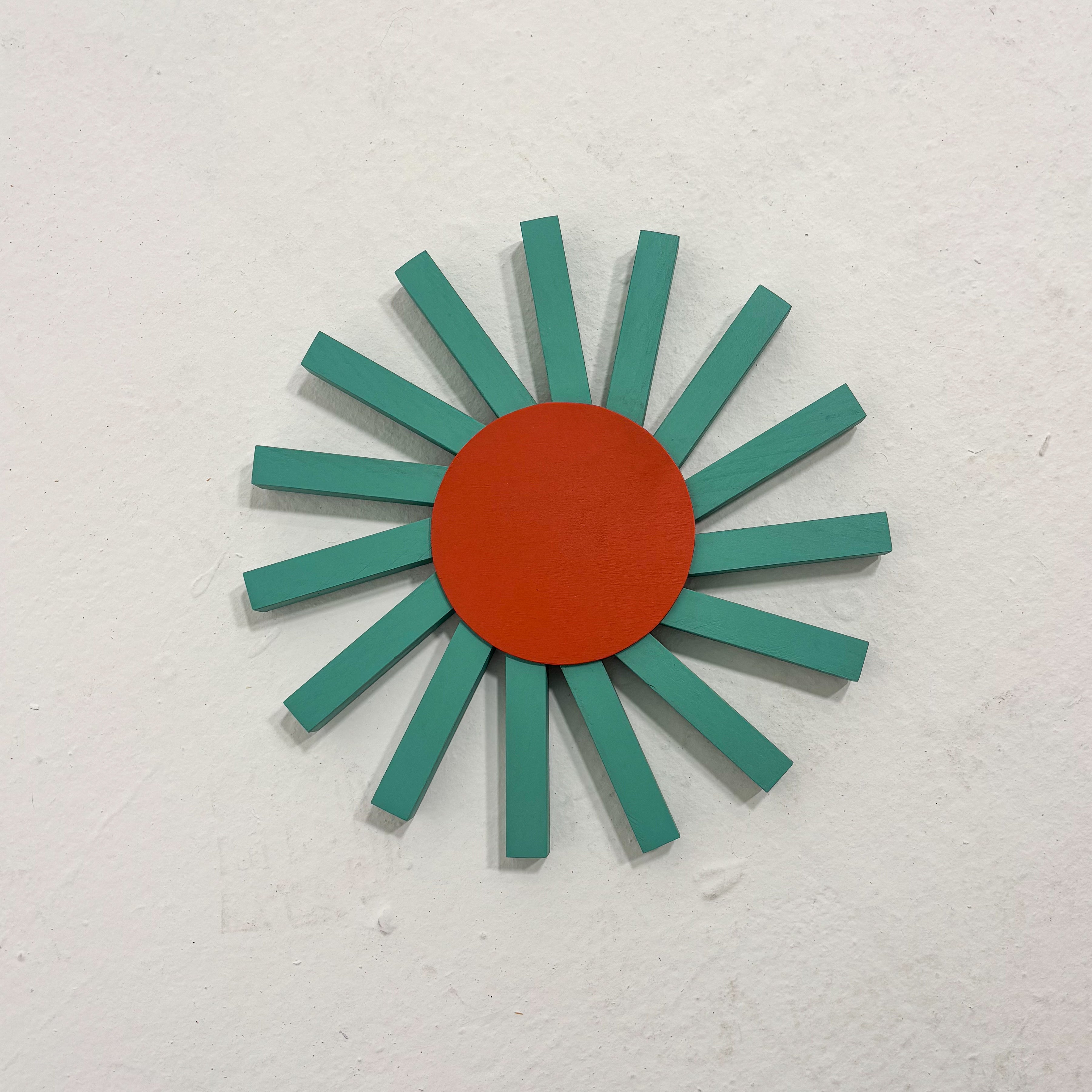 sun sculpture, blue orange